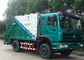 Dongfeng 4x2 6cbmの廃物のコンパクターのトラックDFA1080SJ11D3の油圧屑のごみ収集車 サプライヤー